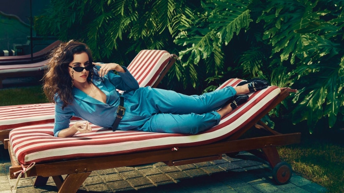 Cristina Rodlo on a lounge chair