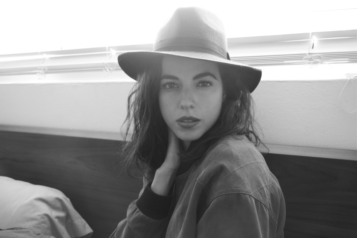 Cristina Rodlo wearing a hat and jacket