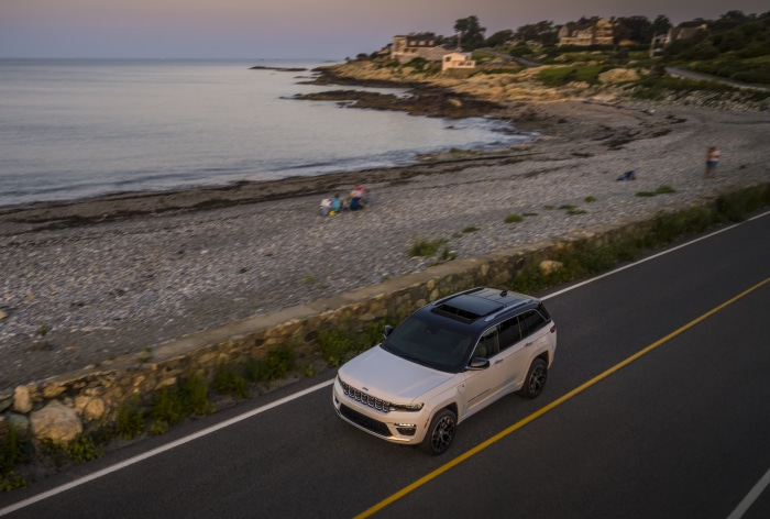 2022 Jeep Grand Cherokee Summit Reserve 4xe on coastal road