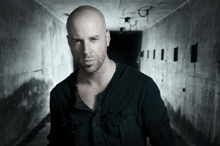 Chris Daughtry in a dark hallway