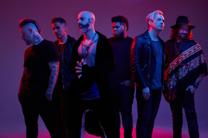 Daughtry band members posing for a photo