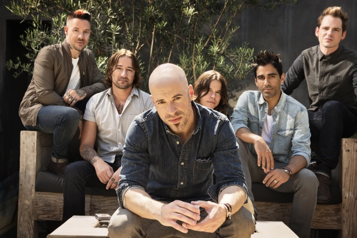 Daughtry band members posing outdoors