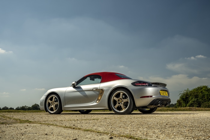 Silver Porsche Boxster Cabriolet with Red Roof