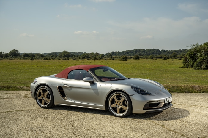 Silver Porsche Boxster Cabriolet with Red Roof