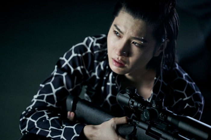 Alice in Borderland character with sniper rifle