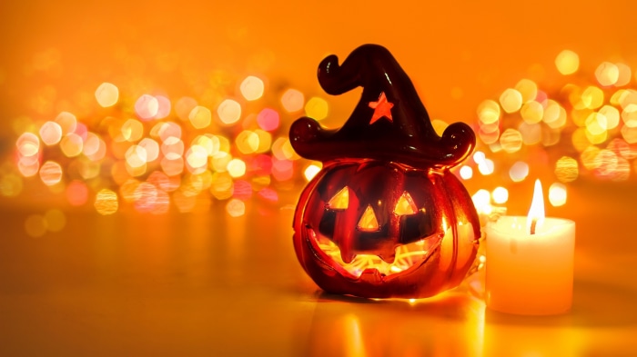 Halloween Jack-O-Lantern with Candle and Bokeh Lights