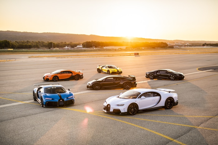 Bugatti Chiron Supercars on Airport Tarmac at Sunset