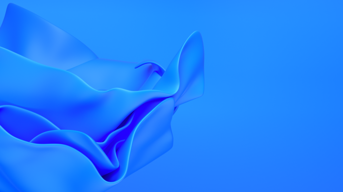 Blue fabric flowing against a blue background