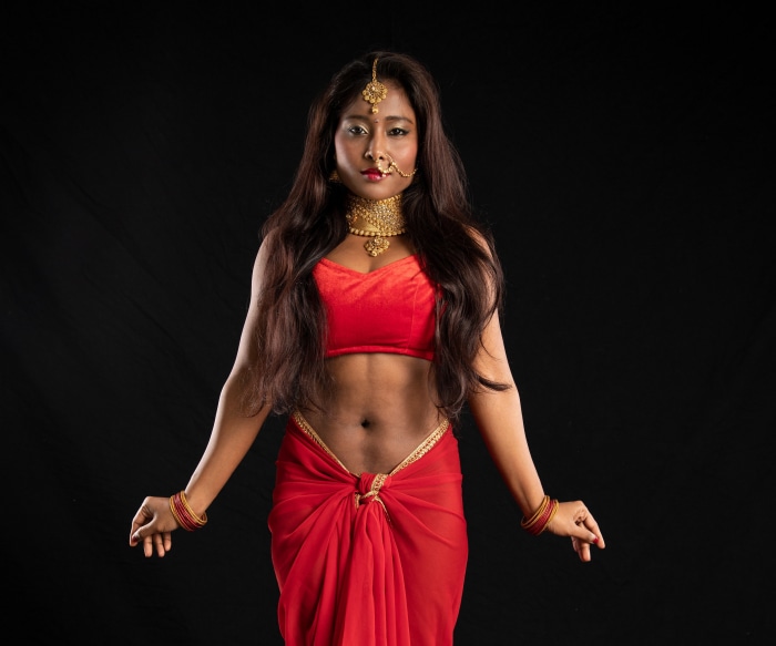 Woman in Red Sari with Traditional Jewelry
