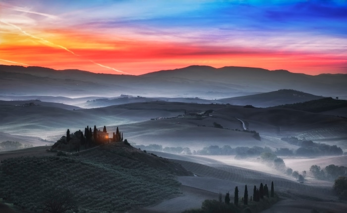 Tuscan Landscape at Sunrise with Fog and Rolling Hills