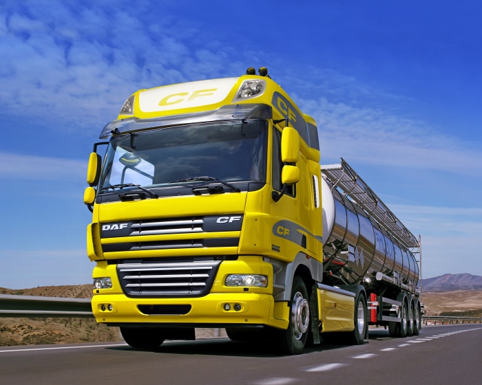 Yellow DAF CF fuel tanker truck on highway