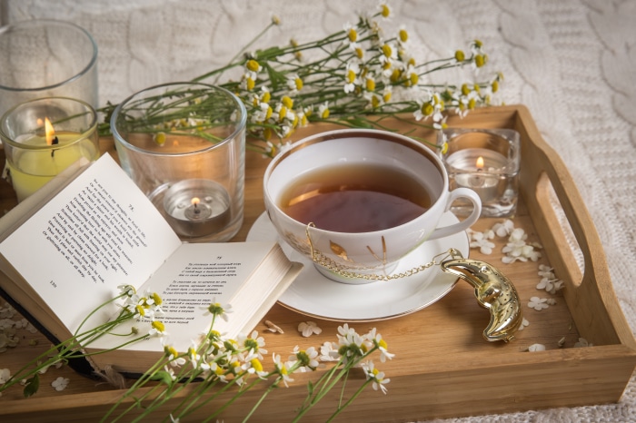 Still life photography with tea and book
