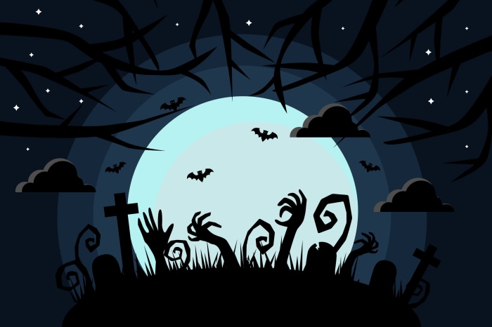 Halloween night with zombies rising from graves under the moon