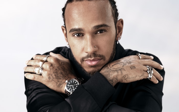 Lewis Hamilton wearing a watch and rings