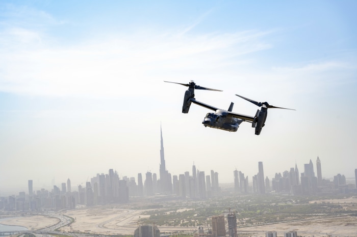 Bell Boeing V-22 Osprey flying over Dubai skyline