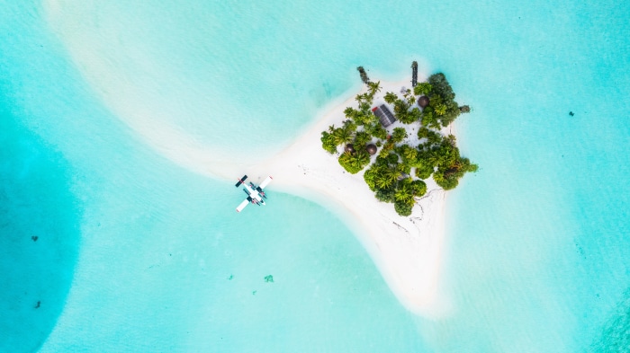 Seaplane near a tropical island in the Maldives