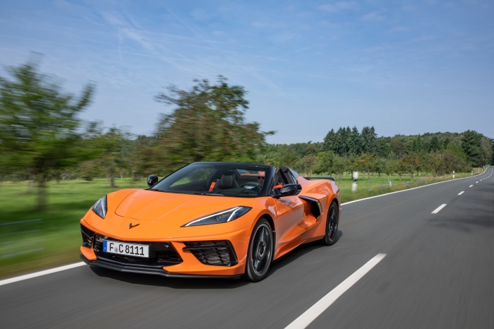 Orange Chevrolet Corvette Stingray Convertible on Road