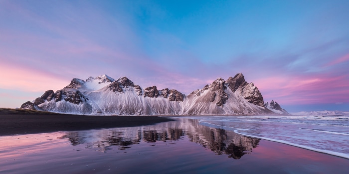Vestrahorn mountains at sunset with reflection