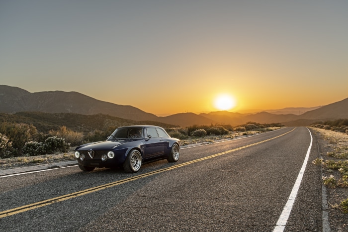 Totem Automobili GT Electric Car on a Road at Sunset