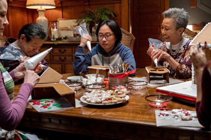 Love Hard: Jimmy O. Yang and family decorating gingerbread houses