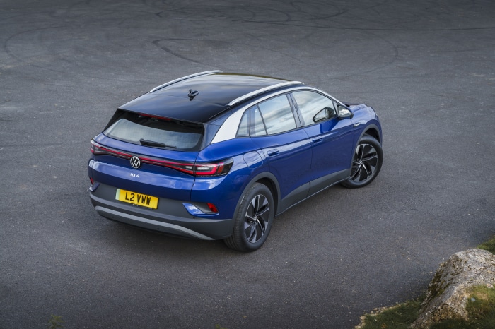 Blue Volkswagen ID.4 electric car on asphalt