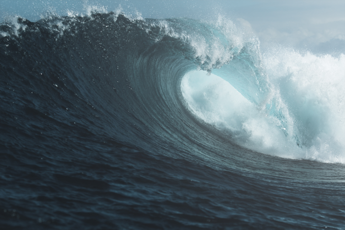 Ocean wave crashing with spray