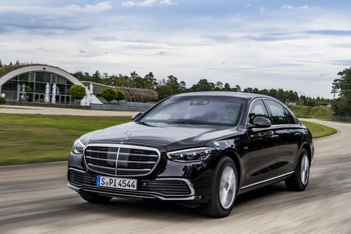 Black Mercedes-Benz S-Class driving on a track