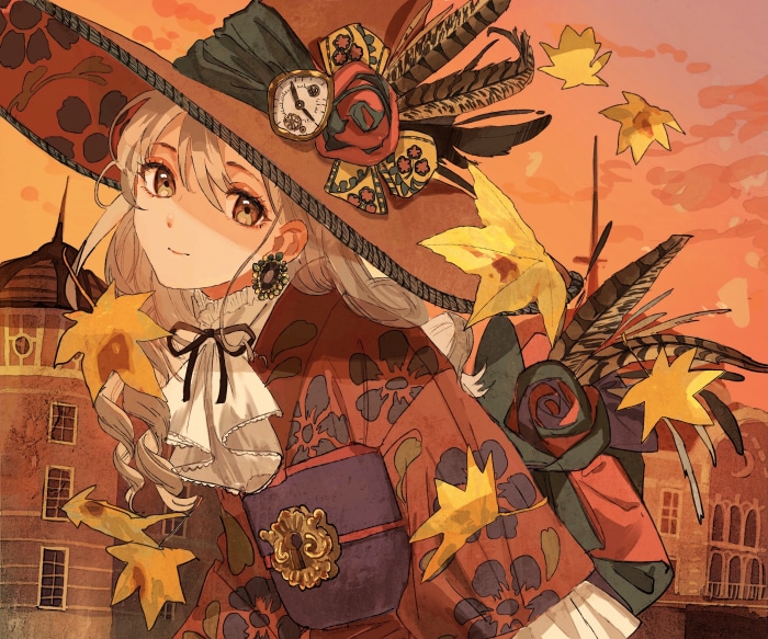 Girl in a hat with autumn leaves