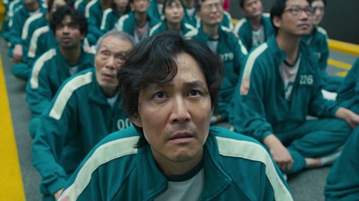 Squid Game contestants in green tracksuits