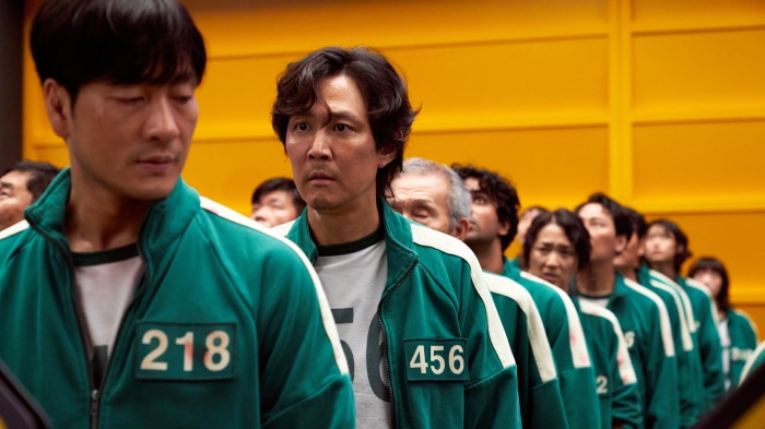 Squid Game players in green tracksuits