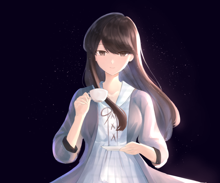 Shoko Komi holding a teacup