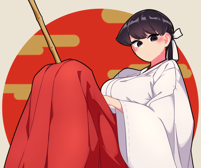 Shoko Komi in a white shrine maiden outfit