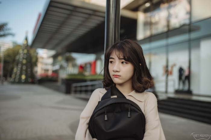 Vietnamese girl with black backpack