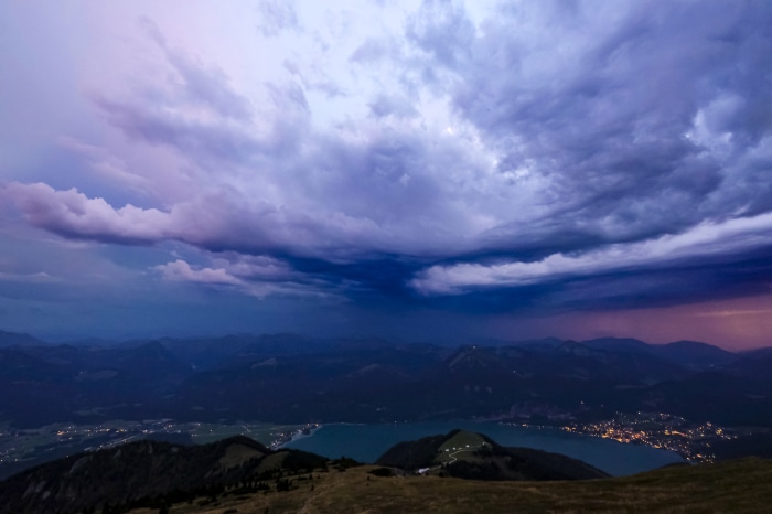 Stormy Clouds Over a Mountain Valley and Lake