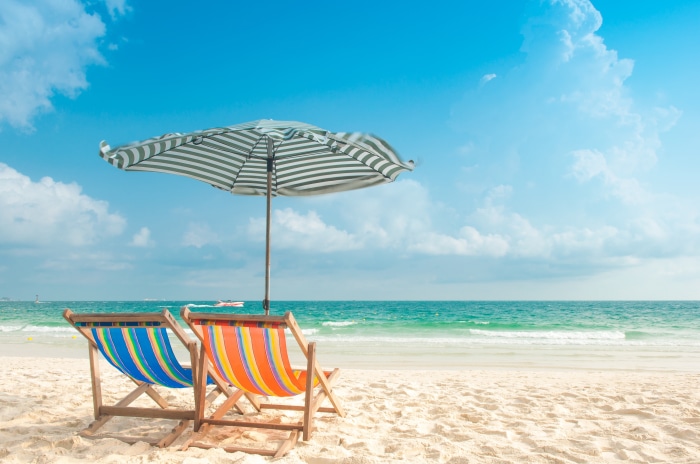 Beach chairs and umbrella on a sandy beach