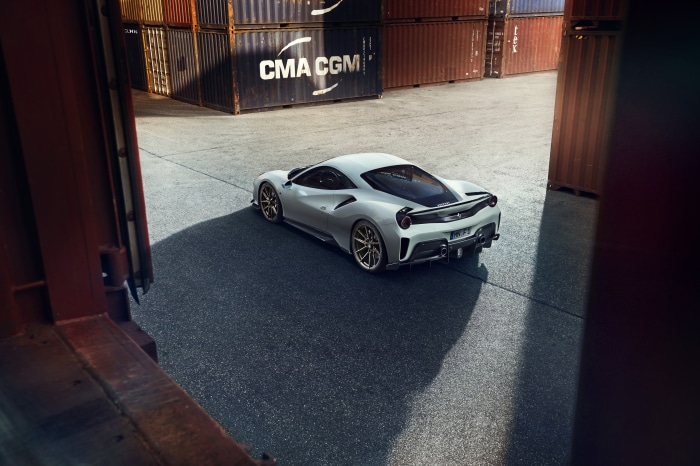 White Ferrari 488 Pista 4K in shipping yard