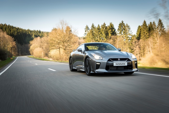 Nissan GT-R driving on a winding road