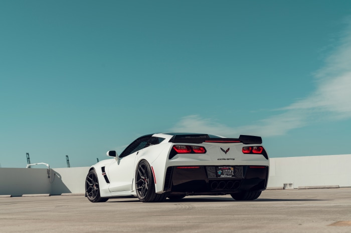 White Chevrolet Corvette C7 on a rooftop