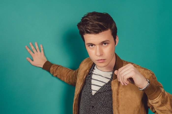Nick Robinson wearing a bomber jacket