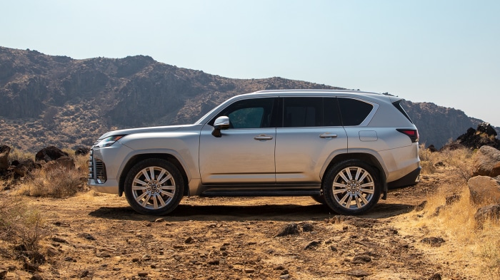 Silver Lexus LX 600 SUV on a rocky terrain