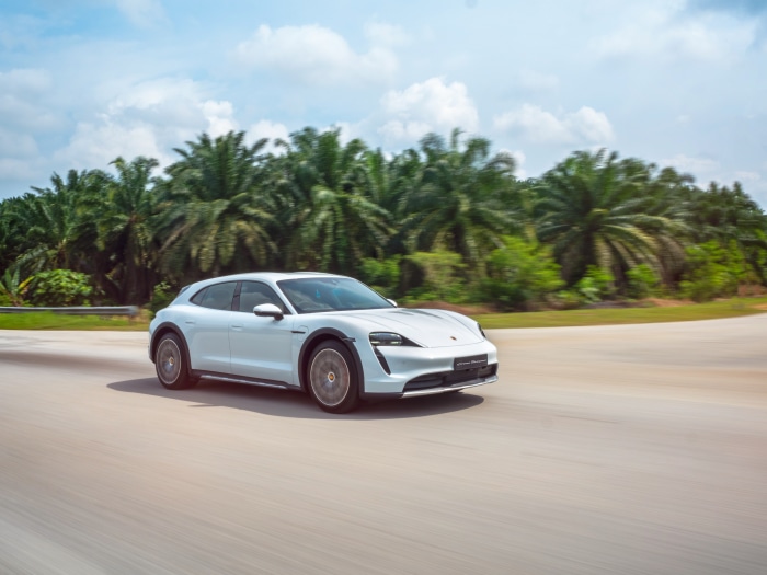 Porsche Taycan 4S Cross Turismo driving on a road