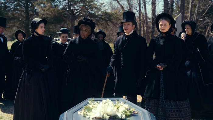 Emily Dickinson at a funeral