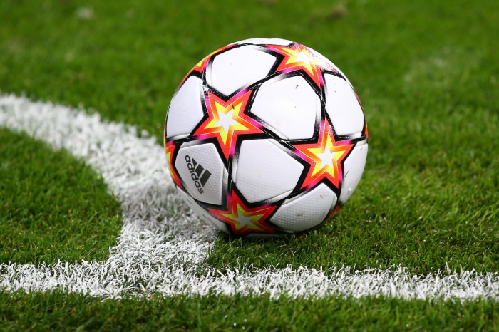 Adidas Soccer Ball on Grass Field