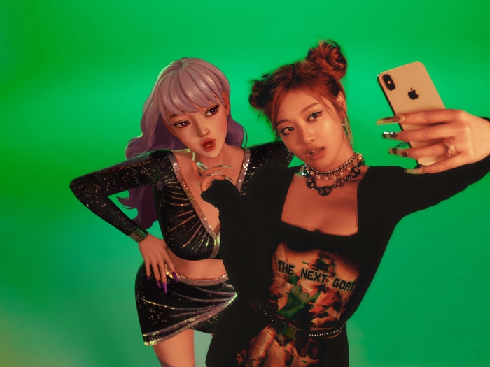 Aespa Ningning taking a selfie with a virtual character