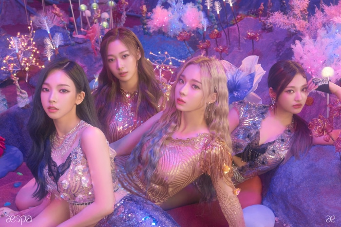 Aespa members Karina, Winter, Giselle, and Ningning in colorful outfits