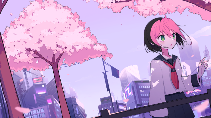 Girl in school uniform under cherry blossoms in city