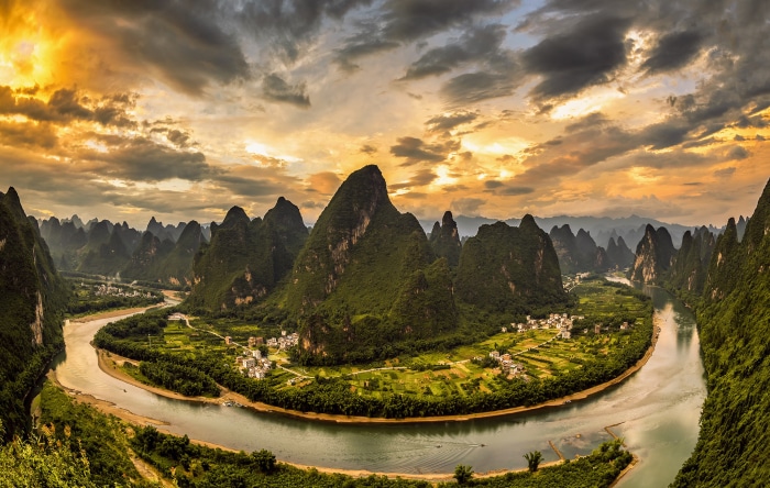 Karst mountains and Li River in China at sunset