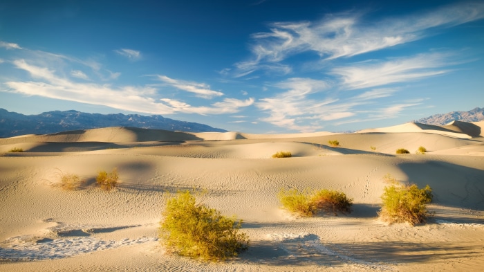 Death Valley Sand Dunes with Mountains and Blue Sky