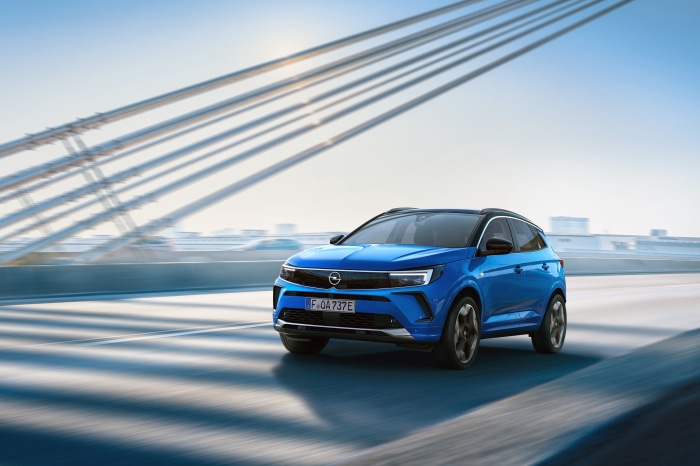 Blue Opel Grandland X Electric SUV on a Bridge