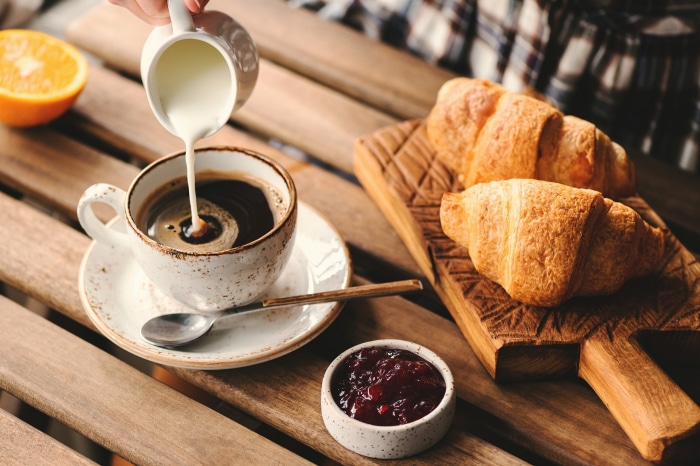 Coffee with croissants and jam